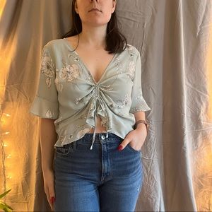 Blue blouse with flowers